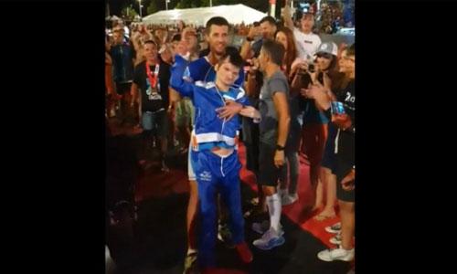 France, Ironman: he carries his disabled brother to pass the finish