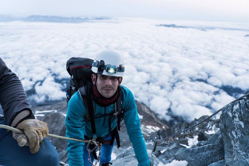 A blind athlete at the top of Mount Kenya.